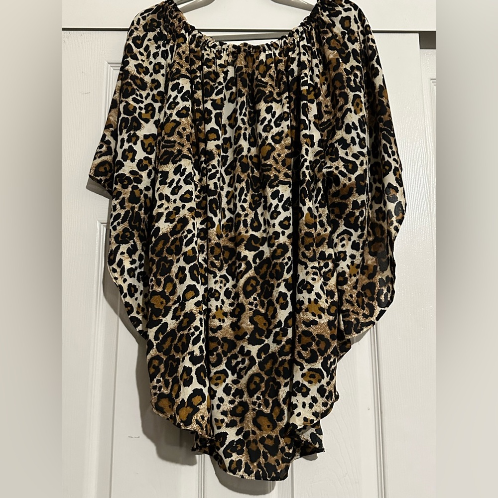 Cheeta print shirt. 100% Polyester